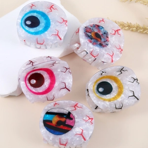 Halloween eyeball hair claw clips in varied colors with creepy red vein textures