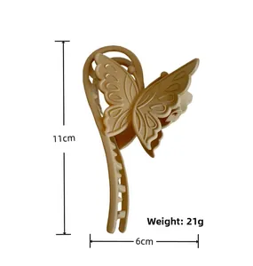 Detailed view of 11cm cream butterfly hair claw clip with size and weight measurements