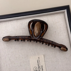 Large vintage caramel tortoise shell hair claw clip with wood texture inlay