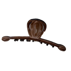 Classic large caramel brown shark hair claw clip with vintage faux wood grain texture finish
