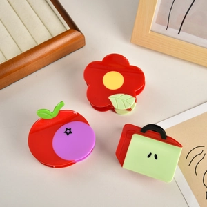 Molloni per capelli in acetato a forma di fiore e mela in rosso e verde