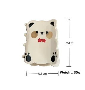 Detail view of cute panda hair claw clip with dimensions 7.5cm by 5.5cm and 35g weight
