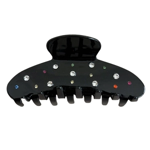 Acetate hair claw clip with colorful rhinestones in a starry night style design