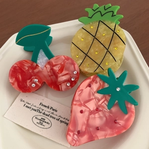 Three-piece fruit hair claws including cherry pineapple and strawberry with rhinestones