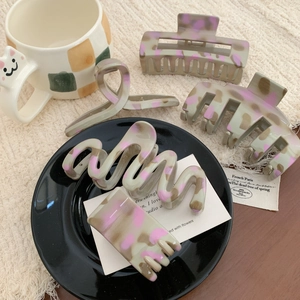 Chic pink and grey marble hair claw clips set in various shapes for elegant hair styling