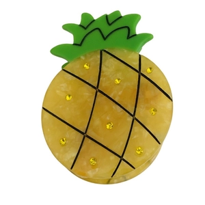 Creative pineapple hair claw made of yellow marble acetate with green leaves and rhinestones