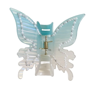Pince à cheveux papillon élégante avec accents de perles et dégradé d'acétate bleu