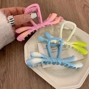 Gradient color bow hair claw clips in matte plastic for Y2K style hairstyling