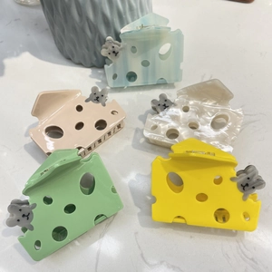 Detailed group view of colorful cheese and mouse hair claws in various vibrant finishes