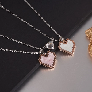 Magnetic pixel heart matching necklaces for couples with silver chain in pink and white