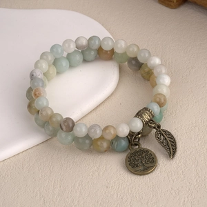 Détails du pendentif arbre de vie sur bracelet en perles de pierre naturelle de 8mm