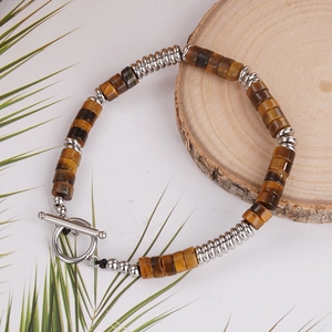 Men's titanium tiger eye beaded bracelet with unique silver spring spacers and toggle clasp