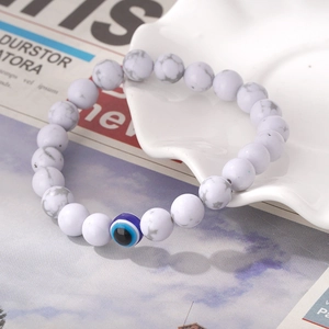 Bracelet en perles de pierre naturelle mate avec breloque œil bleu pour hommes et femmes