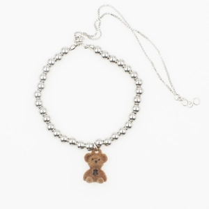 Fashionable silver beaded bracelet with a cute brown flocked bear charm and adjustable chain