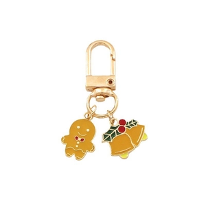 Christmas metal keychain with ginger man and bell enamel charms on a gold lobster clasp