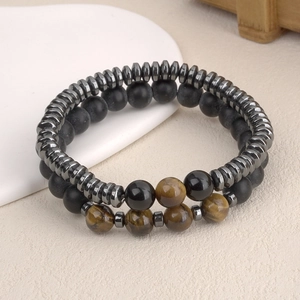 Double-layer beaded bracelet set featuring matte black stones and tiger eye beads