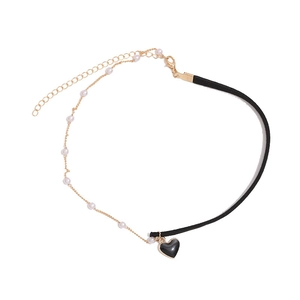 Elegant pearl and black cord choker necklace with a gold-edged heart pendant for women