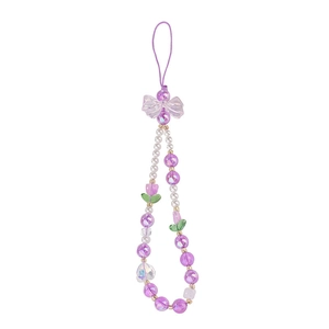 Lanière de téléphone perlée violette avec nœud et fleurs sur fond blanc pour femmes