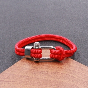 Men's red double-layer paracord bracelet with silver U-shaped horseshoe buckle closure