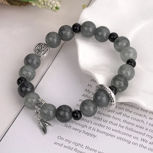 Handmade retro natural stone beaded bracelet with dragon pattern stone and silver charms