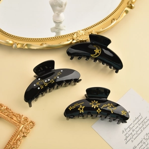 Elegant vintage black star and moon hair claws with rhinestones for elegant styling