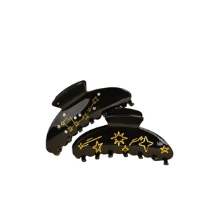 Acetate hair claw set with starry night star and moon patterns and diamond accents
