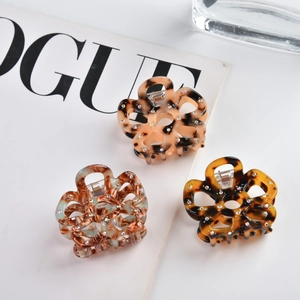 Three-piece set of hollow floral acetate hair claws with rhinestones and tortoiseshell patterns