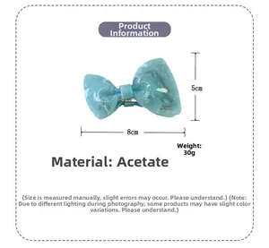 Teal marble acetate bow hair claw clip detail with 8cm and 5cm size dimensions labels