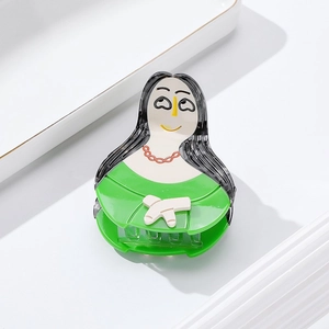 Creative acetate shark hair claw clip featuring a green dress portrait design