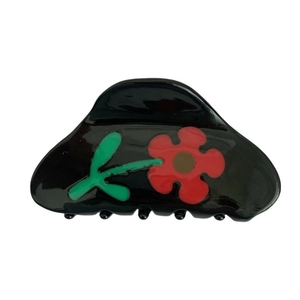 Haarklammer aus Acetat in Schwarz mit rotem Blumendesign für elegantes Haarstyling
