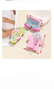 Detailed view of creative acetate hair clips in t-shirt, shorts and slipper shapes
