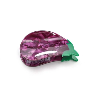 Detailed macro view of an eggplant shaped hair claw clip with purple marble pattern