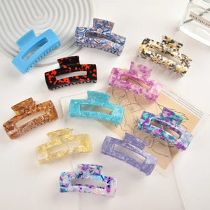 Set of 10 large colorful acetate hair claws in various patterns for stylish women