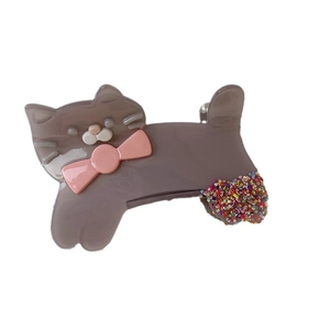 Pince à cheveux chat gris avec nœud rose et paillettes colorées pour la fête