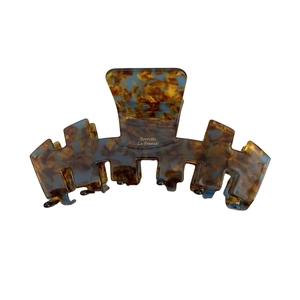 Large acetate hair claw with tortoise shell pattern and golden Barrette La France logo