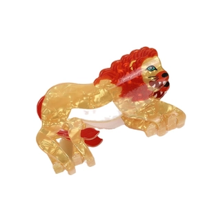 Handcrafted lion acetate hair claw clip with golden marble finish and red mane detail