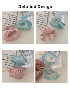 Detail design of oval acetate hair claw clips with marble texture and bow decoration