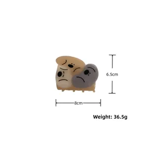 Detail view of 8cm cute dog acetate hair claw clip showing precise size and weight