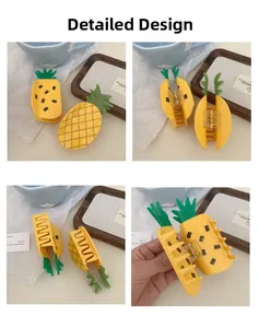 Detailansicht der Ananas-Haarklammern mit Gittermuster und gepunktetem Design