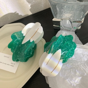 Unique cabbage-shaped acetate hair claw clips in green and white marble finish