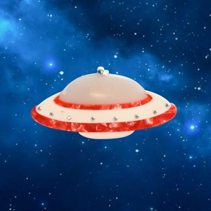 Detail der UFO-Haarklammer aus Acetat mit rotem Marmormuster und bunten Strasssteinen