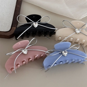 Elegant acetate hair claws with silver ribbon bows and heart rhinestones in four colors