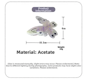 Détail de la grande pince à cheveux papillon en acétate avec dimensions et poids de 33g