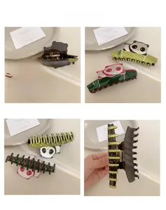 Detailed views of panda hair claw clips with bamboo base and secure metal spring