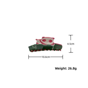 Detailed dimensions of panda hair claw clip showing 10.6cm length and 4.5cm height