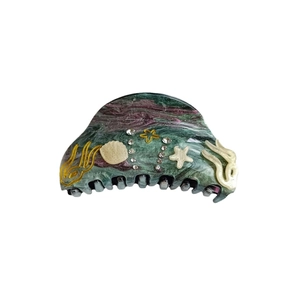 Marine series hair claw clip with marble texture, shell, starfish and crystals on white background