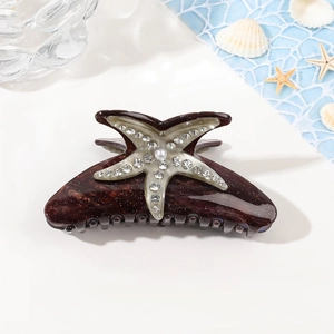 Pince à cheveux étoile de mer élégante avec texture marbrée et strass scintillants