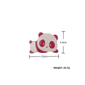 Pink and white acetate panda hair claw clip showing precise size and weight measurements