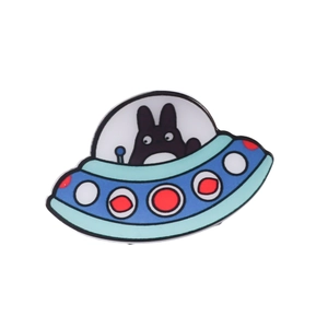 Cute Totoro pilot in a blue UFO enamel pin with colorful lights on white background