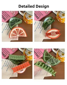 Detailed macro view of vibrant acetate orange and lime fruit hair claw clips with metal spring